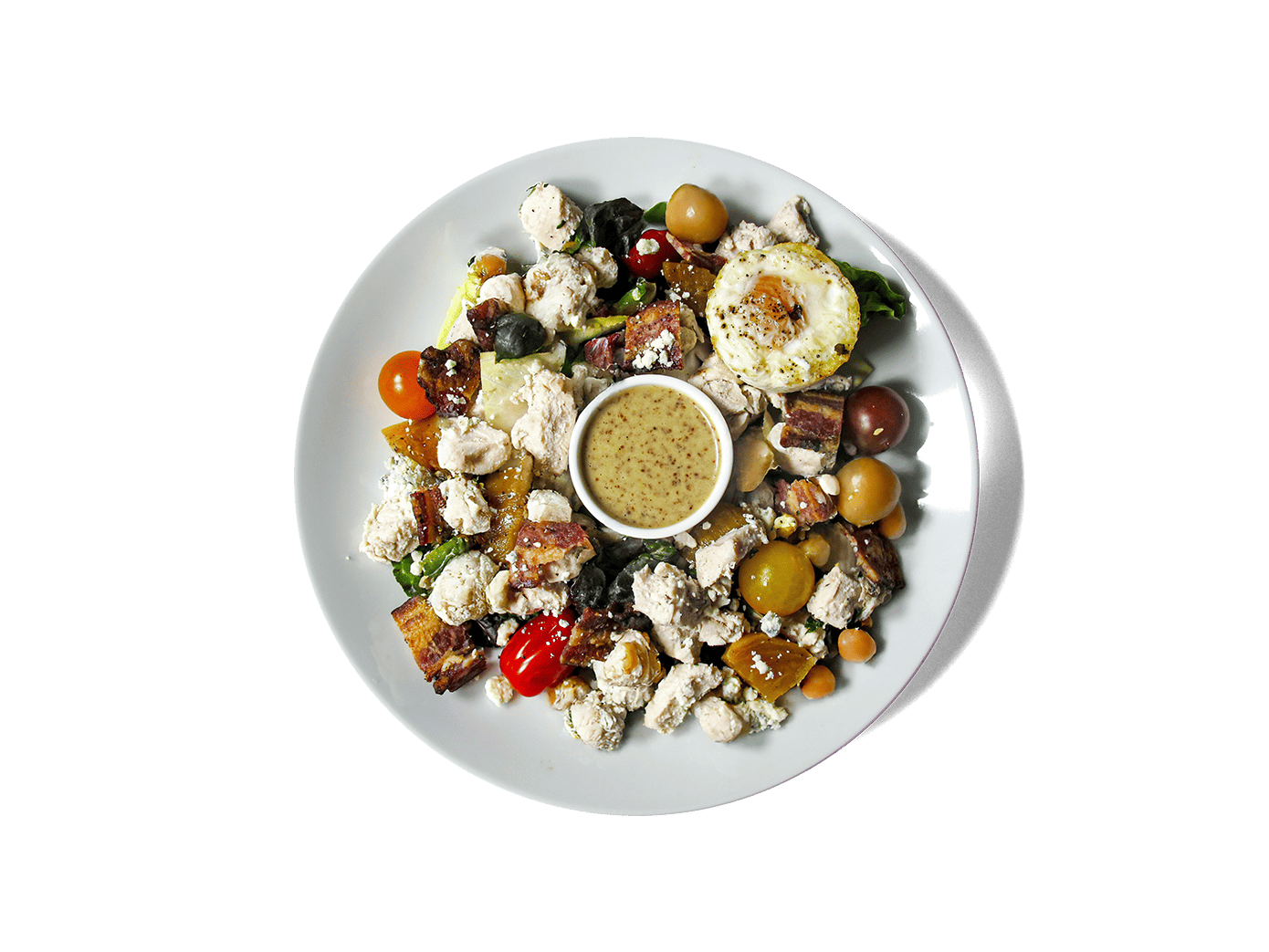 A vibrant, protein-rich twist on the classic Cobb. Featuring Mary's Organic Free-Range Chicken Breast, golden roasted beets, heirloom tomatoes, and a crisp little gem blend, topped with maple-peppered bacon and tangy Point Reyes blue cheese. Finished with a zesty grain mustard-honey dressing and crunchy blue cheese chickpeas on the side. Balanced, satisfying, and built for longevity.