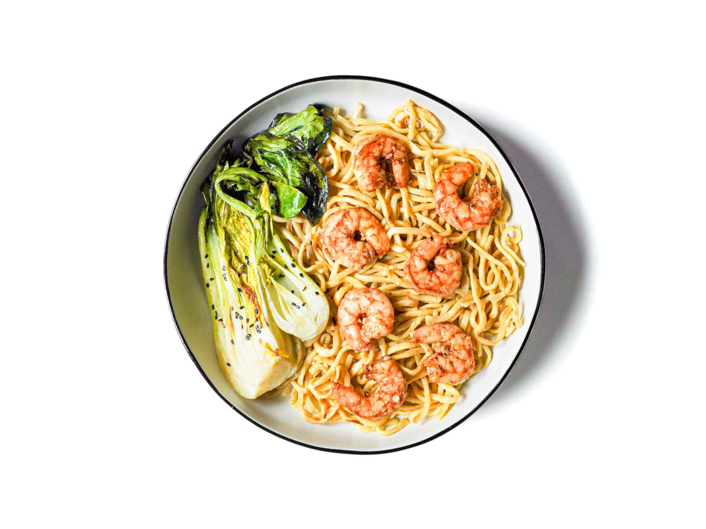 SF Noodle Bar's Garlic Shrimp and Baby Bok Choy offers succulent, garlicky shrimp combined with fresh baby bok choy on a bed of savory garlic noodles. This dish is a flavorful fusion of seafood and greens, ideal for a fresh and satisfying dining experience.