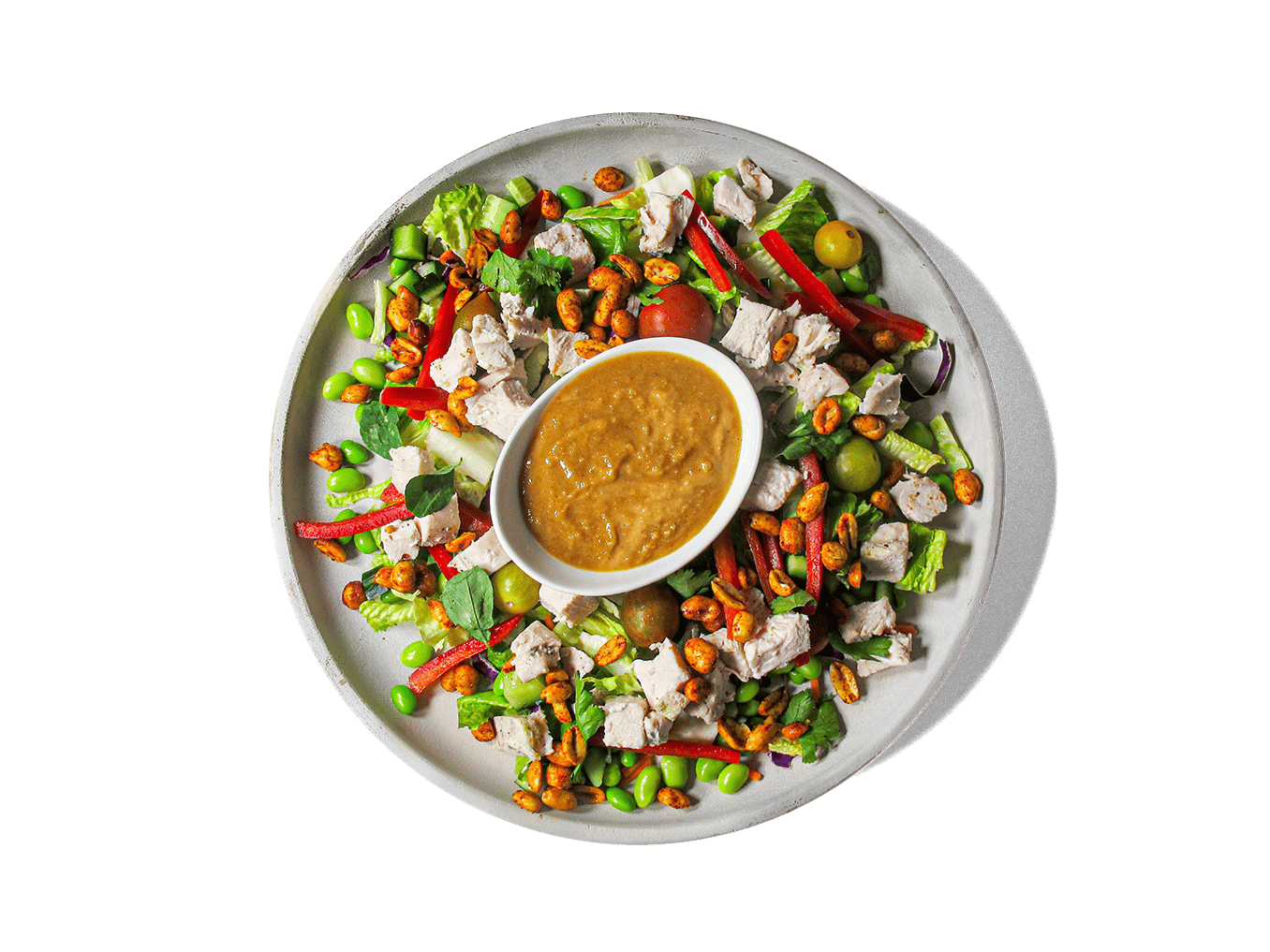 A bold and refreshing Thai Peanut Chicken Salad loaded with high-protein edamame, crisp romaine, red cabbage, and juicy tomatoes. Tender chicken is drizzled with a rich Thai peanut dressing, while crunchy, spicy roasted peanuts add the perfect kick. A vibrant mix of flavors and textures, this nutrient-packed salad is as satisfying as it is delicious!