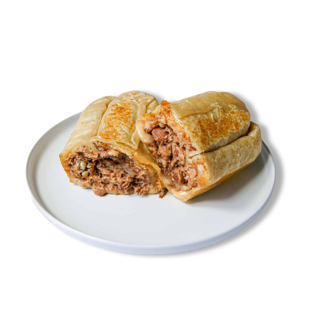 Comal's Bean and Cheese Burrito is a must-have. Made with a flour tortilla filled with ooey-gooey Monterey Jack, sharp white cheddar and refried beans. This is convenient and simple dish packed with flavor.