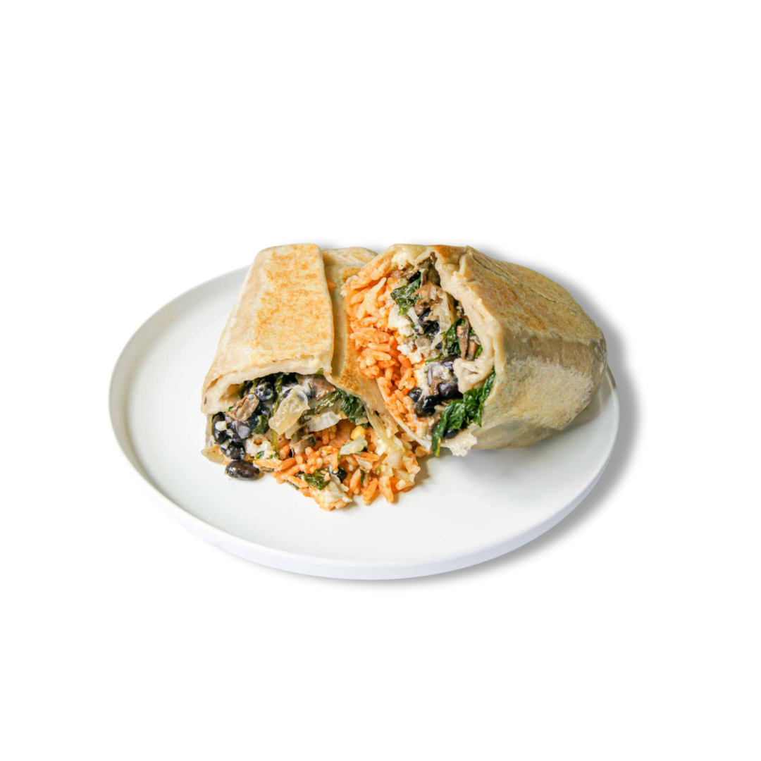 Comal's Spinach and Mushroom Burrito: Wrapped in a warm flour tortilla, it features sautéed spinach, onions, mushrooms, black beans, red rice, cheese, crema, salsa verde, onion, and cilantro.