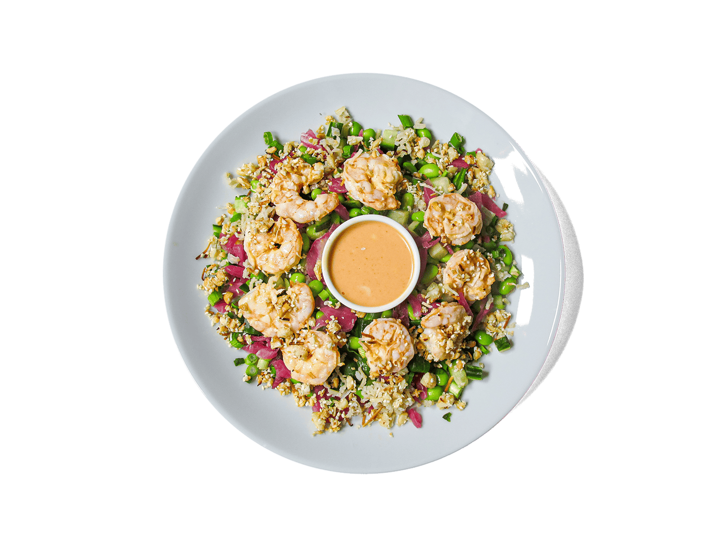 Succulent Bang Bang shrimp, coated in a creamy, spicy sauce, served over coconut-infused jasmine brown rice with crisp edamame, cucumbers, and spinach. Topped with pickled onions, scallions, and a crunchy blend of macadamia, coconut, and sesame for the perfect balance of heat, freshness, and texture. Packed with protein and healthy fats to fuel your body.