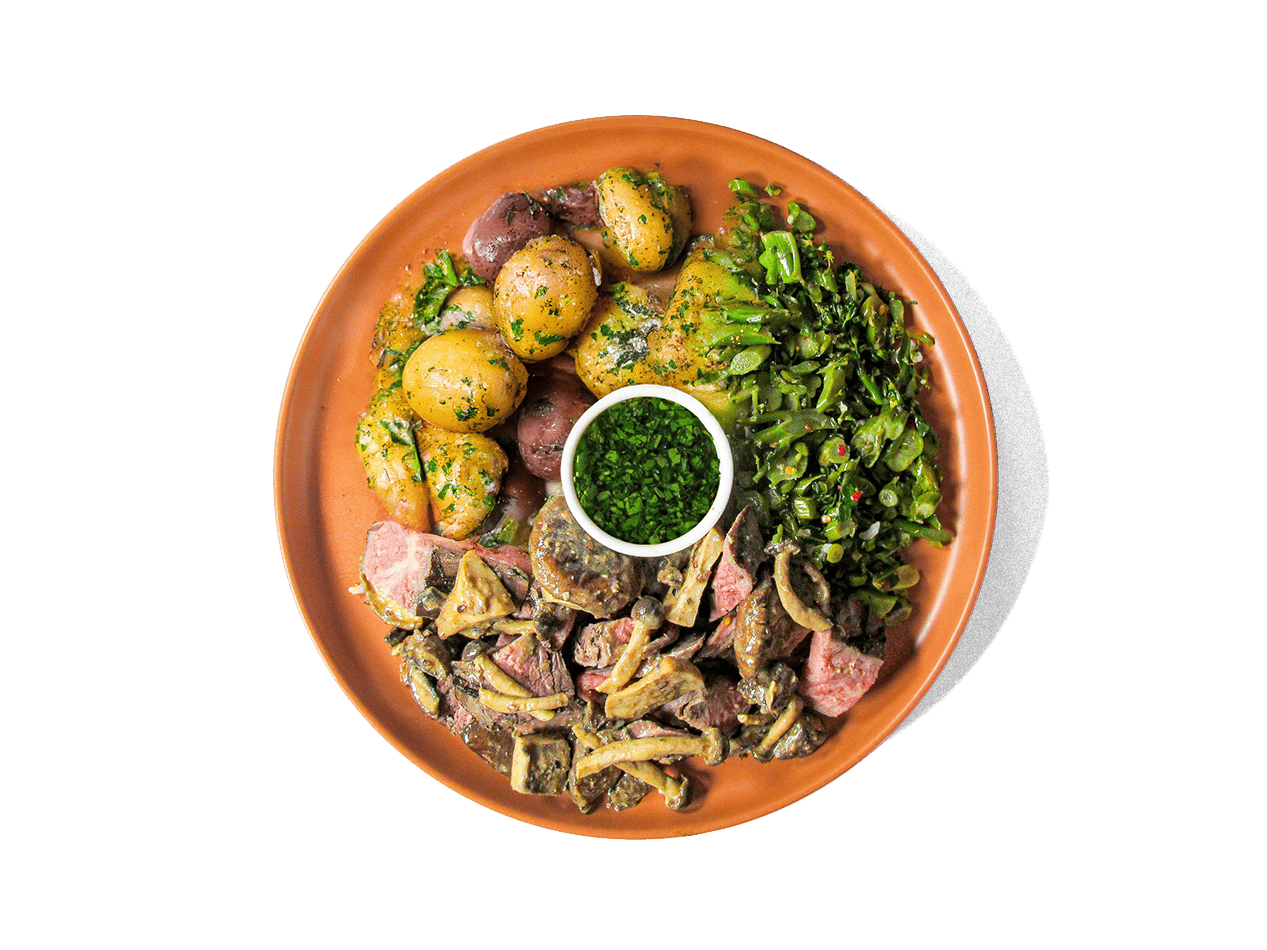 A photo of Grass Fed Steak and Organic Veggies Plate