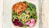 Sumac's Turkish Chicken Salad features marinated organic chicken thighs, roasted seasonal veggies, and pickled beets on a bed of fresh baby spinach topped with sumac vinaigrette. 