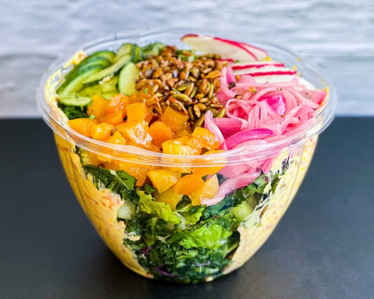 Saucy Greens' Superfood Salad is a vibrant medley of flavors and textures. Refreshing and nourishing, this salad is perfect for a quick and healthy lunch. 