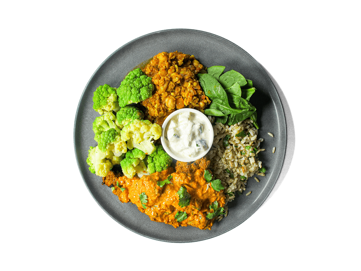 Indulge in our gourmet Butter Chicken, crafted with tender, grilled organic chicken thigh simmered in a rich, velvety tomato-based sauce. Served alongside fragrant bone broth-infused Jeera Rice, protein-packed Dal Tadka, and steamed romanesca, this dish is a powerhouse of bold flavors and nutrients. A side of cooling cucumber raita completes this balanced, high-protein meal—perfect for longevity and indulgence without compromise.