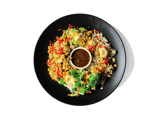 A vibrant, protein-packed bowl with tender teriyaki chicken, hearty brown rice, stir-fried cabbage and carrots, crisp cucumbers, and edamame—topped with pickled ginger and a touch of Siracha Mayo made with our in house avocado mayonnaise. Rich in fiber, protein, and antioxidants, it’s a deliciously balanced meal designed to fuel longevity and vitality.