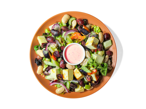 This plant-powered take on the classic Waldorf features crisp apples, heirloom beans, red grapes, celery, and shaved red onion over a bed of super greens. Roasted tofu adds clean, satisfying protein, while a crunchy pumpkin walnut brittle and creamy blood orange dressing bring balance and bold flavor. Packed with fiber, plant protein, and antioxidants to support energy, gut health, and longevity.