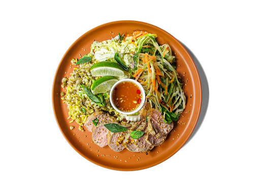 Tender roasted pork meets fragrant turmeric-lentil rice, layered with a crisp medley of pickled cucumber, daikon, carrot, and radish. Finished with fresh herbs, spicy sriracha aioli, and a zingy nuoc cham dressing, this bowl delivers bold Vietnamese-inspired flavor with a protein-rich, anti-inflammatory twist. Topped with toasted sesame and hemp seeds for a longevity boost.