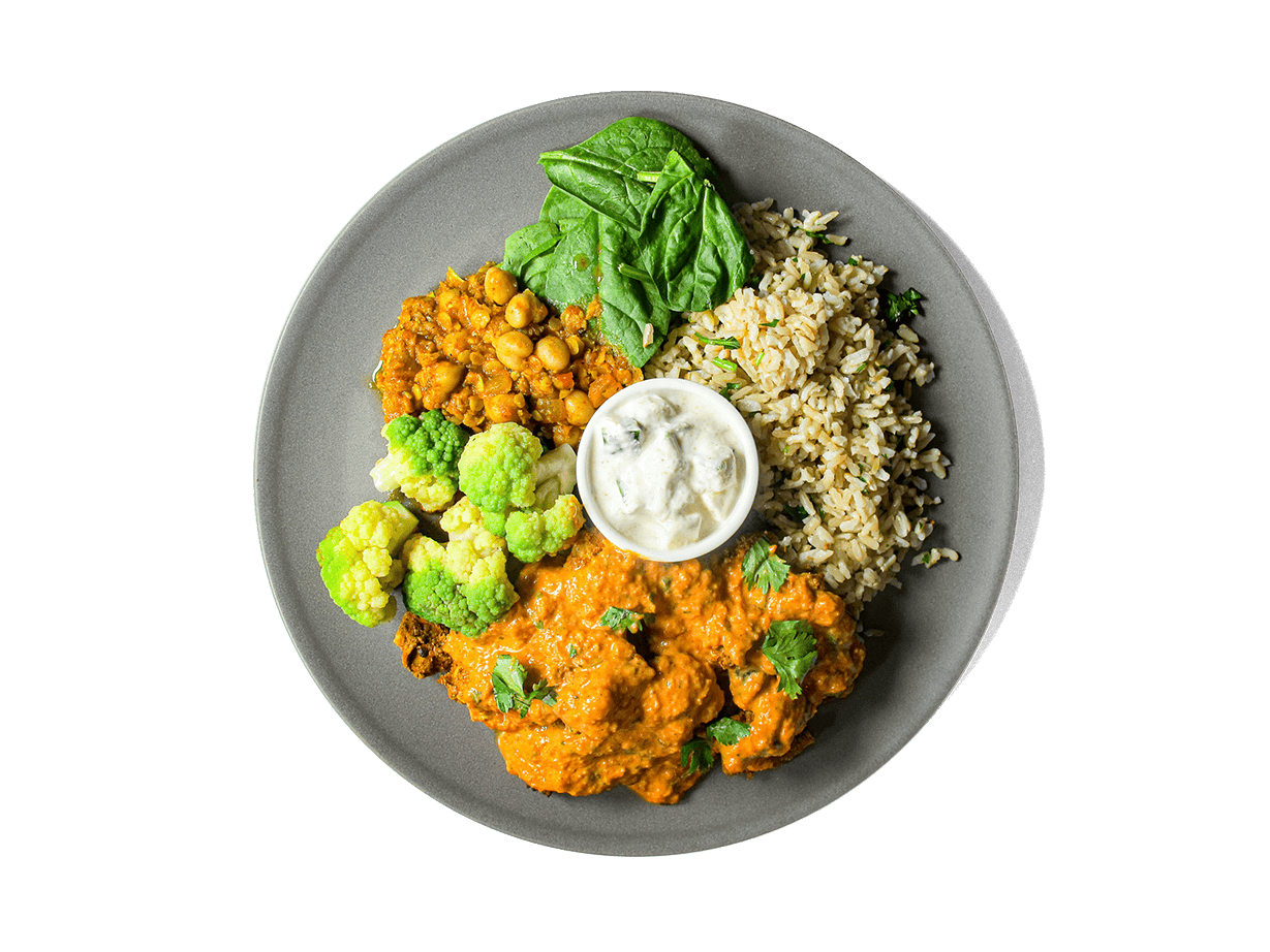 Indulge in our gourmet Butter Chicken, crafted with tender, spiced chicken simmered in a rich, velvety tomato-based sauce. Served alongside fragrant bone broth-infused Jeera Rice, protein-packed Dal Tadka, and smoky roasted eggplant, this dish is a powerhouse of bold flavors and nourishment. A side of cooling cucumber raita and wholesome whole wheat pita completes this balanced, high-protein meal—perfect for longevity and indulgence without compromise.