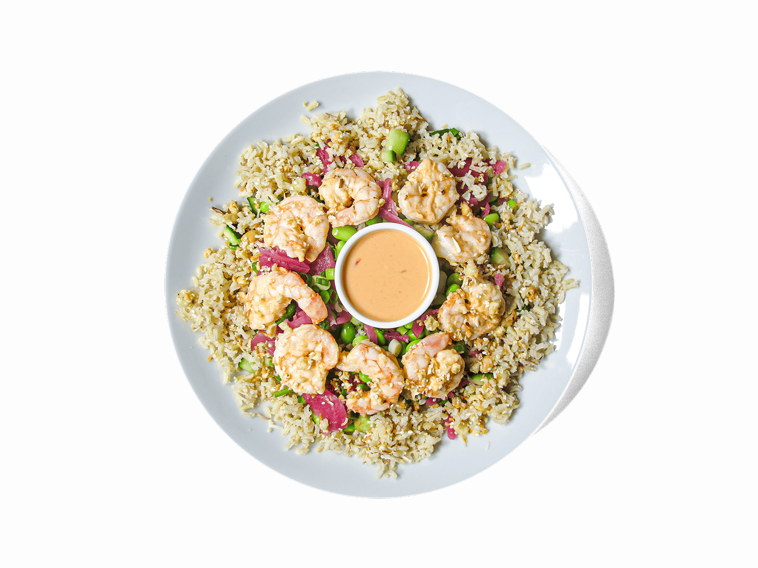 Succulent Bang Bang shrimp, coated in a creamy, spicy sauce, served over coconut-infused jasmine brown rice with crisp edamame, cucumbers, and spinach. Topped with pickled onions, scallions, and a crunchy blend of macadamia, coconut, and sesame for the perfect balance of heat, freshness, and texture. Packed with protein and healthy fats to fuel your body.