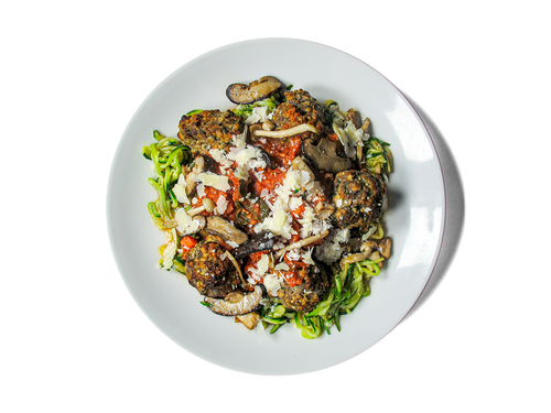 Tender, protein-rich meatballs made from pasture-raised beef and hemp seeds, simmered in a rich Sunday Gravy with Italian sausage and San Marzano tomatoes. Served over a balanced duo of whole wheat spaghetti and zucchini noodles, topped with aged Grana Padano. Comes with a vibrant Super Greens Caesar salad boosted with chickpeas and hemp seeds for an extra hit of plant-based power. A hearty, longevity-focused twist on a classic Italian favorite.