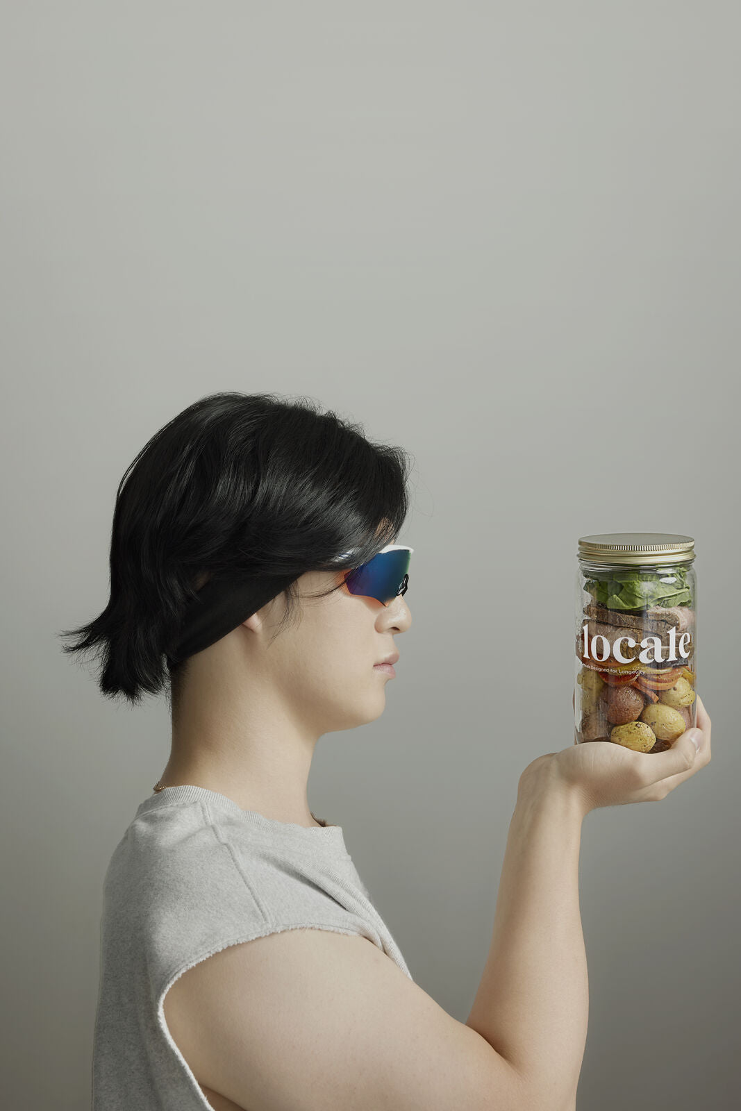 Man studying a Locale meal jar
